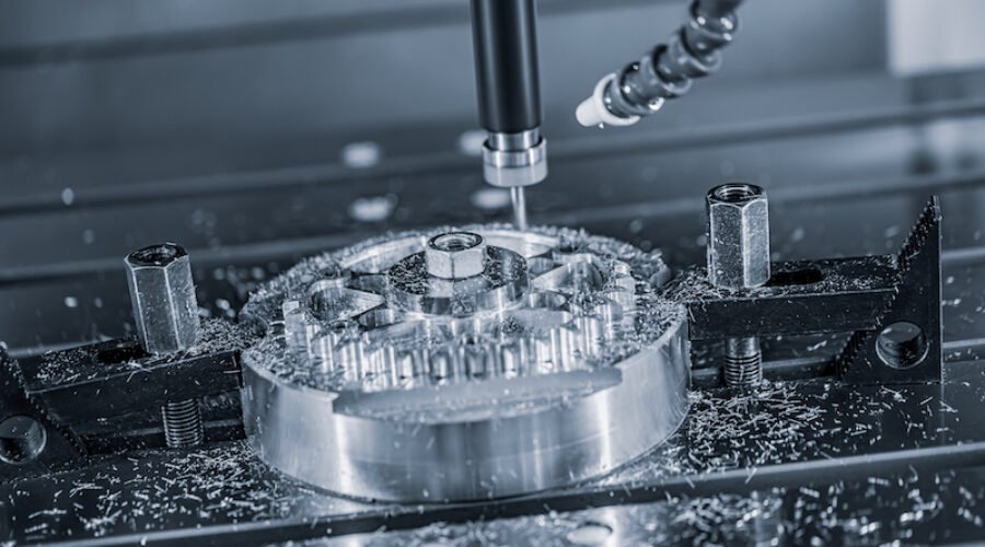 Metalworking CNC lathe milling machine. Cutting metal modern processing technology. Milling is the process of machining using rotary cutters to remove material by advancing a cutter into a workpiece.